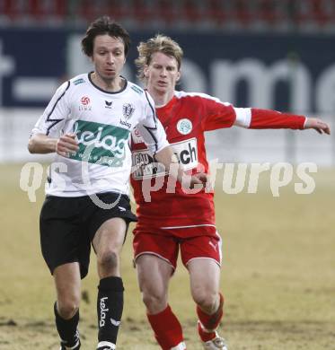 Fussball. Tipp3-Bundesliga. SK Austria Kelag Kaernten  gegen SV Mattersburg. Wolfgang Bubenik  (Austria Kaernten), Michael Moerz (Mattersburg). Klagenfurt, 28.2.2009. 
Foto: Kuess

---
pressefotos, pressefotografie, kuess, qs, qspictures, sport, bild, bilder, bilddatenbank