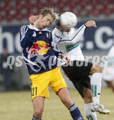 Fussball. Tipp3-Bundesliga. SK Austria Kelag Kaernten  gegen RB Salzburg. Oliver Pusztai, (Austria Kaernten), Marc Janko  (Salzburg). Klagenfurt, 4.3..2009. 
Foto: Kuess

---
pressefotos, pressefotografie, kuess, qs, qspictures, sport, bild, bilder, bilddatenbank