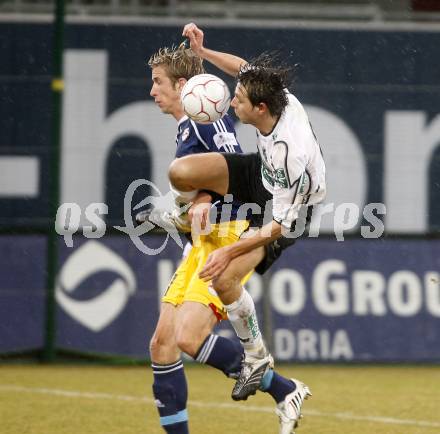 Fussball. Tipp3-Bundesliga. SK Austria Kelag Kaernten  gegen RB Salzburg. Wolfgang Bubenik, (Austria Kaernten), Marc Janko (Salzburg). Klagenfurt, 4.3..2009. 
Foto: Kuess

---
pressefotos, pressefotografie, kuess, qs, qspictures, sport, bild, bilder, bilddatenbank