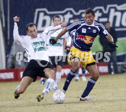 Fussball. Tipp3-Bundesliga. SK Austria Kelag Kaernten  gegen RB Salzburg. Manuel Ortlechner, (Austria Kaernten), Johan Vonlanthen (Salzburg). Klagenfurt, 4.3..2009. 
Foto: Kuess

---
pressefotos, pressefotografie, kuess, qs, qspictures, sport, bild, bilder, bilddatenbank