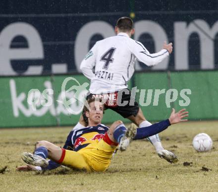 Fussball. Tipp3-Bundesliga. SK Austria Kelag Kaernten  gegen RB Salzburg. Oliver Pusztai, (Austria Kaernten),  Marc Janko (Salzburg). Klagenfurt, 4.3..2009. 
Foto: Kuess

---
pressefotos, pressefotografie, kuess, qs, qspictures, sport, bild, bilder, bilddatenbank