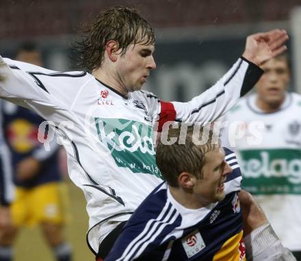 Fussball. Tipp3-Bundesliga. SK Austria Kelag Kaernten  gegen RB Salzburg. Manuel Weber,(Austria Kaernten),  Karel Pitak (Salzburg). Klagenfurt, 4.3..2009. 
Foto: Kuess

---
pressefotos, pressefotografie, kuess, qs, qspictures, sport, bild, bilder, bilddatenbank