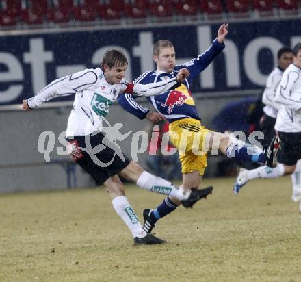 Fussball. Tipp3-Bundesliga. SK Austria Kelag Kaernten  gegen RB Salzburg. Manuel Weber, (Austria Kaernten), Karel Pitak (Salzburg). Klagenfurt, 4.3..2009. 
Foto: Kuess

---
pressefotos, pressefotografie, kuess, qs, qspictures, sport, bild, bilder, bilddatenbank