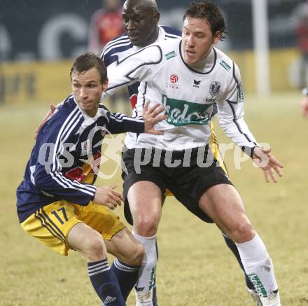 Fussball. Tipp3-Bundesliga. SK Austria Kelag Kaernten  gegen RB Salzburg. Maier Santos Schumacher Thiago (Austria Kaernten), Andreas Ulmer (Salzburg). Klagenfurt, 4.3..2009. 
Foto: Kuess

---
pressefotos, pressefotografie, kuess, qs, qspictures, sport, bild, bilder, bilddatenbank