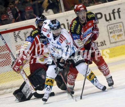 EBEL. Eishockey Bundesliga. KAC gegen EHC LIWEST Linz. Travis Scott, Johannes Kirisits, (KAC), Mark Szuecs (Linz). Klagenfurt, am 5.3.2009.
Foto: Kuess 

---
pressefotos, pressefotografie, kuess, qs, qspictures, sport, bild, bilder, bilddatenbank