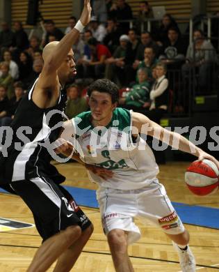 Basketball Bundesliga. Woerthersee Piraten gegen Guessing Knights. Marco Breithuber (Piraten), Marqus Ledoux (Guessing). Klagenfurt, am 8.3.2009.
Foto: Kuess

---
pressefotos, pressefotografie, kuess, qs, qspictures, sport, bild, bilder, bilddatenbank