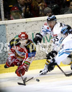 EBEL. Eishockey Bundesliga. KAC gegen EHC Liwest Linz. Andrew Schneider (KAC), Robert Lukas (Linz). Klagenfurt, am 10.3.2009.
Foto: Kuess
---
pressefotos, pressefotografie, kuess, qs, qspictures, sport, bild, bilder, bilddatenbank