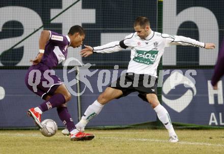 Fussball. Tipp3-Bundesliga. SK Austria Kelag Kaernten  gegen Austria Wien. Oliver Pusztai, (Austria Kaernten),Ruben Okotie (Wien). Klagenfurt, 14.3..2009. 
Foto: Kuess

---
pressefotos, pressefotografie, kuess, qs, qspictures, sport, bild, bilder, bilddatenbank