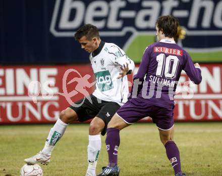 Fussball. Tipp3-Bundesliga. SK Austria Kelag Kaernten  gegen Austria Wien. Haris Bukva, (Austria Kaernten), Emin Sulimani (Wien). Klagenfurt, 14.3..2009. 
Foto: Kuess

---
pressefotos, pressefotografie, kuess, qs, qspictures, sport, bild, bilder, bilddatenbank