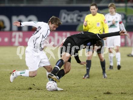 Fussball. Tipp3-Bundesliga. SK Austria Kelag Kaernten  gegen Sturm Graz. Marc Sand, (Austria Kaernten),  Fabian Lamotte  (Graz). Klagenfurt, 18.3..2009. 
Foto: Kuess

---
pressefotos, pressefotografie, kuess, qs, qspictures, sport, bild, bilder, bilddatenbank