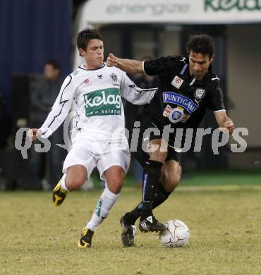 Fussball. Tipp3-Bundesliga. SK Austria Kelag Kaernten  gegen Sturm Graz. Zlatko Junuzovic, (Austria Kaernten), Peter Hlinka (Graz). Klagenfurt, 18.3..2009. 
Foto: Kuess

---
pressefotos, pressefotografie, kuess, qs, qspictures, sport, bild, bilder, bilddatenbank