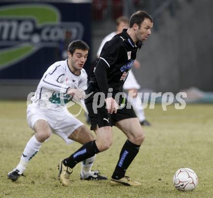 Fussball. Tipp3-Bundesliga. SK Austria Kelag Kaernten  gegen Sturm Graz. Marco Salvatore, (Austria Kaernten), Mario Haas (Graz). Klagenfurt, 18.3..2009. 
Foto: Kuess

---
pressefotos, pressefotografie, kuess, qs, qspictures, sport, bild, bilder, bilddatenbank