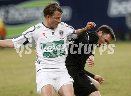 Fussball. Tipp3-Bundesliga. SK Austria Kelag Kaernten  gegen Sturm Graz. Thomas Riedl, (Austria Kaernten), Muratovic Samir  (Graz). Klagenfurt, 18.3..2009. 
Foto: Kuess

---
pressefotos, pressefotografie, kuess, qs, qspictures, sport, bild, bilder, bilddatenbank