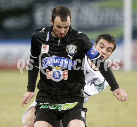 Fussball. Tipp3-Bundesliga. SK Austria Kelag Kaernten  gegen Sturm Graz. Marco Salvatore, (Austria Kaernten), Mario Haas (Graz). Klagenfurt, 18.3..2009. 
Foto: Kuess

---
pressefotos, pressefotografie, kuess, qs, qspictures, sport, bild, bilder, bilddatenbank