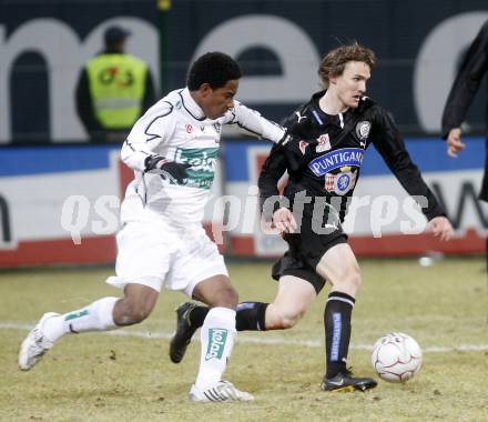 Fussball. Tipp3-Bundesliga. SK Austria Kelag Kaernten  gegen Sturm Graz. Sandro, (Austria Kaernten), Andreas Hoelzl (Graz). Klagenfurt, 18.3..2009. 
Foto: Kuess

---
pressefotos, pressefotografie, kuess, qs, qspictures, sport, bild, bilder, bilddatenbank