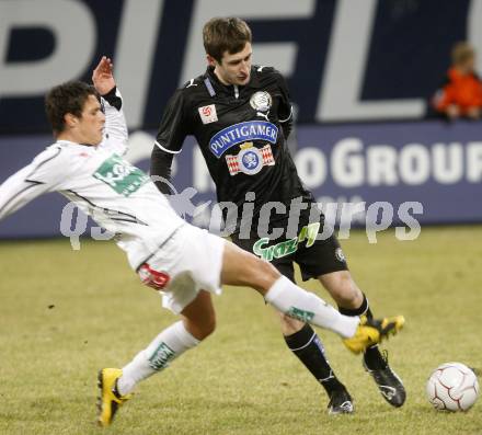 Fussball. Tipp3-Bundesliga. SK Austria Kelag Kaernten  gegen Sturm Graz. Zlatko Junuzovic, (Austria Kaernten),  Ilia Kandelaki (Graz). Klagenfurt, 18.3..2009. 
Foto: Kuess

---
pressefotos, pressefotografie, kuess, qs, qspictures, sport, bild, bilder, bilddatenbank