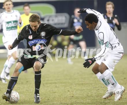 Fussball. Tipp3-Bundesliga. SK Austria Kelag Kaernten  gegen Sturm Graz. Sandro Jose Da Silva (Austria Kaernten),  Daniel Beichler (Graz). Klagenfurt, 18.3..2009. 
Foto: Kuess

---
pressefotos, pressefotografie, kuess, qs, qspictures, sport, bild, bilder, bilddatenbank