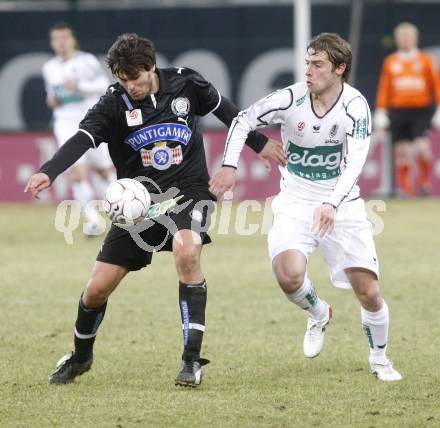 Fussball. Tipp3-Bundesliga. SK Austria Kelag Kaernten  gegen Sturm Graz. Marc Sand (Austria Kaernten),  Fabian Lamotte (Graz). Klagenfurt, 18.3..2009. 
Foto: Kuess

---
pressefotos, pressefotografie, kuess, qs, qspictures, sport, bild, bilder, bilddatenbank