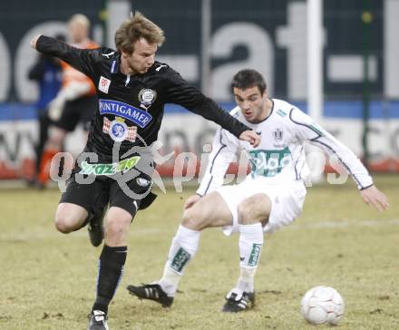 Fussball. Tipp3-Bundesliga. SK Austria Kelag Kaernten  gegen Sturm Graz. Marco Salvatore (Austria Kaernten),  Mario Kienzl (Graz). Klagenfurt, 18.3..2009. 
Foto: Kuess

---
pressefotos, pressefotografie, kuess, qs, qspictures, sport, bild, bilder, bilddatenbank