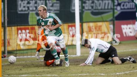 Fussball. Tipp3-Bundesliga. SK Austria Kelag Kaernten gegen SK Rapid. Oliver Pusztai, (Kaernten), Erwin Hoffer (Rapid). Klagenfurt, 21.3..2009. 
Foto: Kuess

---
pressefotos, pressefotografie, kuess, qs, qspictures, sport, bild, bilder, bilddatenbank