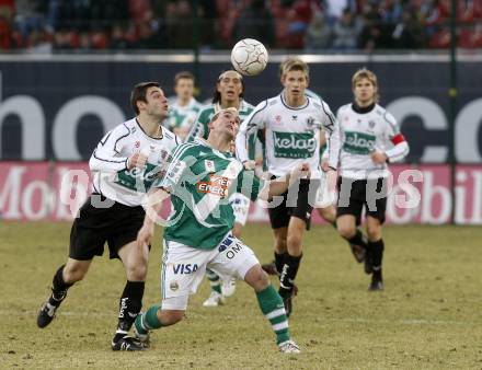 Fussball. Tipp3-Bundesliga. SK Austria Kelag Kaernten gegen SK Rapid. Marco Salvatore, (Kaernten), Erwin Hoffer (Rapid). Klagenfurt, 21.3..2009. 
Foto: Kuess

---
pressefotos, pressefotografie, kuess, qs, qspictures, sport, bild, bilder, bilddatenbank