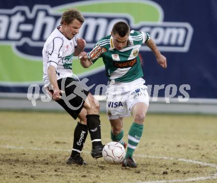 Fussball. Tipp3-Bundesliga. SK Austria Kelag Kaernten gegen SK Rapid. Thomas Riedl, (Kaernten), Steffen Hoffmann (Rapid). Klagenfurt, 21.3..2009. 
Foto: Kuess

---
pressefotos, pressefotografie, kuess, qs, qspictures, sport, bild, bilder, bilddatenbank