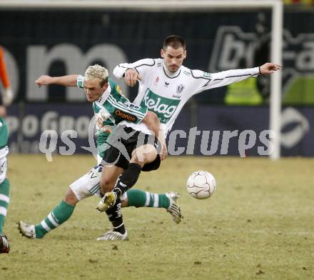 Fussball. Tipp3-Bundesliga. SK Austria Kelag Kaernten gegen SK Rapid. Oliver Pusztai,(Kaernten),  Erwin Hoffer (Rapid). Klagenfurt, 21.3..2009. 
Foto: Kuess

---
pressefotos, pressefotografie, kuess, qs, qspictures, sport, bild, bilder, bilddatenbank