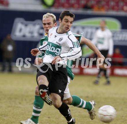Fussball. Tipp3-Bundesliga. SK Austria Kelag Kaernten gegen SK Rapid. Marco Salvatore, (Kaernten), Erwin Hoffer (Rapid). Klagenfurt, 21.3..2009. 
Foto: Kuess

---
pressefotos, pressefotografie, kuess, qs, qspictures, sport, bild, bilder, bilddatenbank