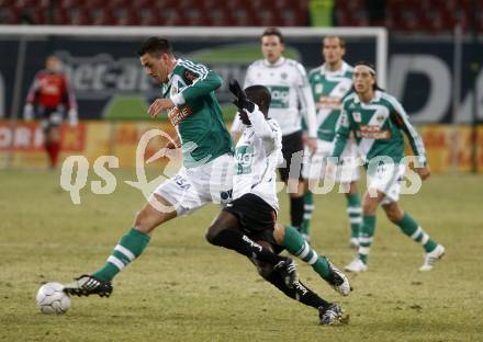 Fussball. Tipp3-Bundesliga. SK Austria Kelag Kaernten gegen SK Rapid. Modou Jagne, (Kaernten), Stefan Maierhofer (Rapid). Klagenfurt, 21.3..2009. 
Foto: Kuess

---
pressefotos, pressefotografie, kuess, qs, qspictures, sport, bild, bilder, bilddatenbank