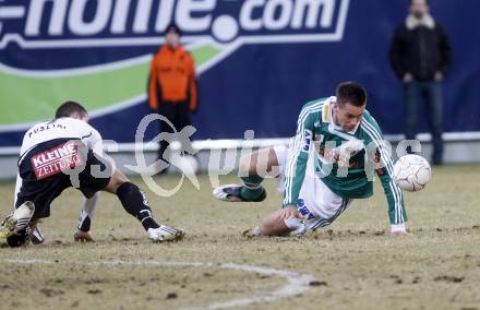 Fussball. Tipp3-Bundesliga. SK Austria Kelag Kaernten gegen SK Rapid. Oliver Pusztai, (Kaernten), Stefan Maierhofer (Rapid). Klagenfurt, 21.3..2009. 
Foto: Kuess

---
pressefotos, pressefotografie, kuess, qs, qspictures, sport, bild, bilder, bilddatenbank