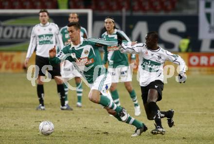 Fussball. Tipp3-Bundesliga. SK Austria Kelag Kaernten gegen SK Rapid. Modou Jagne, (Kaernten), Stefan Maierhofer (Rapid). Klagenfurt, 21.3..2009. 
Foto: Kuess

---
pressefotos, pressefotografie, kuess, qs, qspictures, sport, bild, bilder, bilddatenbank