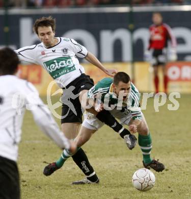 Fussball. Tipp3-Bundesliga. SK Austria Kelag Kaernten gegen SK Rapid. Wolfgang Bubenik, (Kaernten), Steffen Hoffmann (Rapid). Klagenfurt, 21.3..2009. 
Foto: Kuess

---
pressefotos, pressefotografie, kuess, qs, qspictures, sport, bild, bilder, bilddatenbank