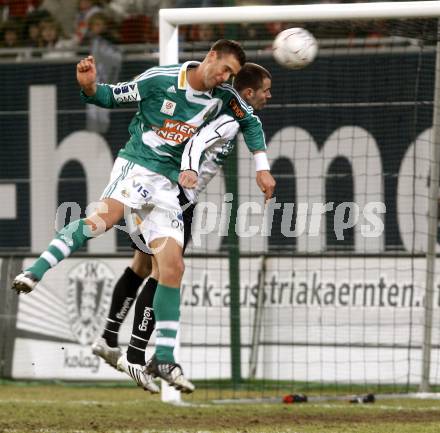 Fussball. Tipp3-Bundesliga. SK Austria Kelag Kaernten gegen SK Rapid. Oliver Pusztai, (Kaernten), Stefan Maierhofer (Rapid). Klagenfurt, 21.3..2009. 
Foto: Kuess

---
pressefotos, pressefotografie, kuess, qs, qspictures, sport, bild, bilder, bilddatenbank