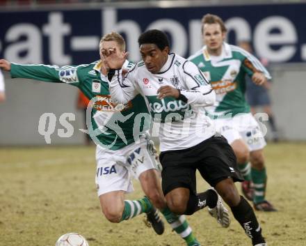Fussball. Tipp3-Bundesliga. SK Austria Kelag Kaernten gegen SK Rapid. Sandro, (Kaernten), Christian Thonhofer (Rapid). Klagenfurt, 21.3..2009. 
Foto: Kuess

---
pressefotos, pressefotografie, kuess, qs, qspictures, sport, bild, bilder, bilddatenbank