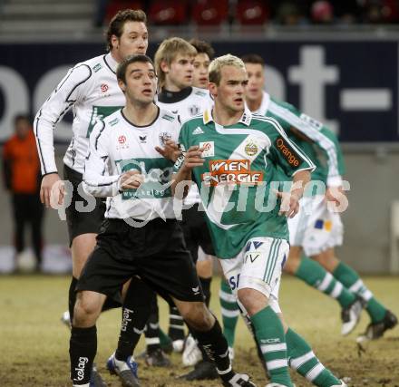 Fussball. Tipp3-Bundesliga. SK Austria Kelag Kaernten gegen SK Rapid. Marco Salvatore, (Kaernten), Erwin Hoffer (Rapid). Klagenfurt, 21.3..2009. 
Foto: Kuess

---
pressefotos, pressefotografie, kuess, qs, qspictures, sport, bild, bilder, bilddatenbank