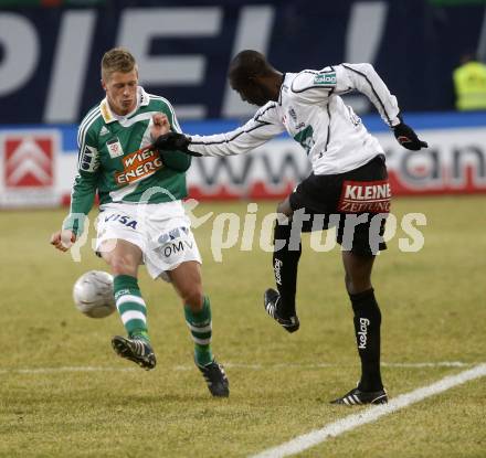 Fussball. Tipp3-Bundesliga. SK Austria Kelag Kaernten gegen SK Rapid. Modou Jagne, (Kaernten), Christian Thonhofer (Rapid). Klagenfurt, 21.3..2009. 
Foto: Kuess

---
pressefotos, pressefotografie, kuess, qs, qspictures, sport, bild, bilder, bilddatenbank