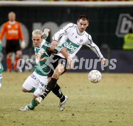 Fussball. Tipp3-Bundesliga. SK Austria Kelag Kaernten gegen SK Rapid. Oliver Pusztai,(Kaernten),  Erwin Hoffer (Rapid). Klagenfurt, 21.3..2009. 
Foto: Kuess

---
pressefotos, pressefotografie, kuess, qs, qspictures, sport, bild, bilder, bilddatenbank