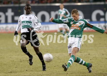 Fussball. Tipp3-Bundesliga. SK Austria Kelag Kaernten gegen SK Rapid. Modou Jagne,(Kaernten),  Christian Thonhofer (Rapid). Klagenfurt, 21.3..2009. 
Foto: Kuess

---
pressefotos, pressefotografie, kuess, qs, qspictures, sport, bild, bilder, bilddatenbank