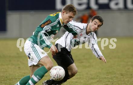 Fussball. Tipp3-Bundesliga. SK Austria Kelag Kaernten gegen SK Rapid. Marco Salvatore, (Kaernten), Nikica Jelavic (Rapid). Klagenfurt, 21.3..2009. 
Foto: Kuess

---
pressefotos, pressefotografie, kuess, qs, qspictures, sport, bild, bilder, bilddatenbank