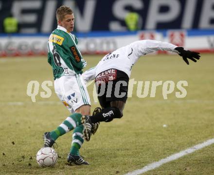 Fussball. Tipp3-Bundesliga. SK Austria Kelag Kaernten gegen SK Rapid. Modou Jagne, (Kaernten), Christian Thonhofer (Rapid). Klagenfurt, 21.3..2009. 
Foto: Kuess

---
pressefotos, pressefotografie, kuess, qs, qspictures, sport, bild, bilder, bilddatenbank