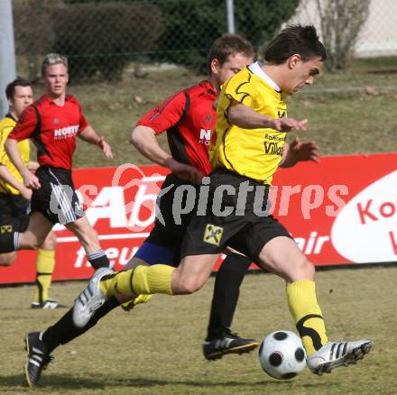 Fussball. Unterliga West. Magdalener SC gegen SV Union Stall. Zukanovic Alen (Magdalen), Berger Arnold  (Stall). Magdalen, 22.3.2009. 
Foto: Kuess

---
pressefotos, pressefotografie, kuess, qs, qspictures, sport, bild, bilder, bilddatenbank