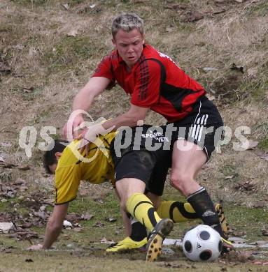 Fussball. Unterliga West. Magdalener SC gegen SV Union Stall. Stattmann Christoph (Magdalen), Salentinig Thomas (Stall). Magdalen, 22.3.2009. 
Foto: Kuess

---
pressefotos, pressefotografie, kuess, qs, qspictures, sport, bild, bilder, bilddatenbank