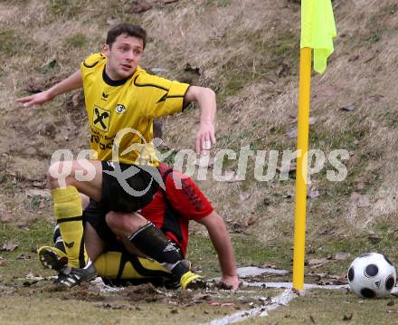 Fussball. Unterliga West. Magdalener SC gegen SV Union Stall. Stattmann Christoph (Magdalen), Salentinig Thomas (Stall). Magdalen, 22.3.2009. 
Foto: Kuess

---
pressefotos, pressefotografie, kuess, qs, qspictures, sport, bild, bilder, bilddatenbank