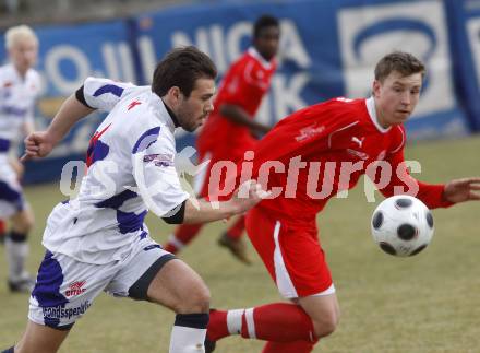 Fussball Regionalliga. SAK gegen SV Spittal. Edmir Edo Adilovic (SAK) Wernitznig Christopher (Spittal). Klagenfurt, am 28.3.2009.
Foto: Kuess

---
pressefotos, pressefotografie, kuess, qs, qspictures, sport, bild, bilder, bilddatenbank