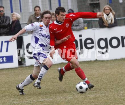 Fussball Regionalliga. SAK gegen SV Spittal. Grega Triplat (SAK) Stornig Patrick (Spittal). Klagenfurt, am 28.3.2009.
Foto: Kuess

---
pressefotos, pressefotografie, kuess, qs, qspictures, sport, bild, bilder, bilddatenbank