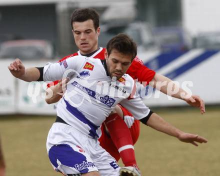 Fussball Regionalliga. SAK gegen SV Spittal. Edmir Edo Adilovic, (SAK) Hirschbuehl Johannes (Spittal). Klagenfurt, am 28.3.2009.
Foto: Kuess

---
pressefotos, pressefotografie, kuess, qs, qspictures, sport, bild, bilder, bilddatenbank