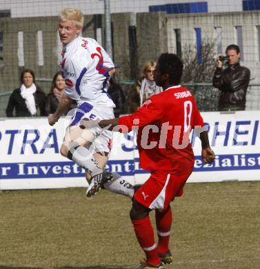 Fussball Regionalliga. SAK gegen SV Spittal. Rene Partl (SAK) Mpaka Makanda Christian (Spittal). Klagenfurt, am 28.3.2009.
Foto: Kuess

---
pressefotos, pressefotografie, kuess, qs, qspictures, sport, bild, bilder, bilddatenbank