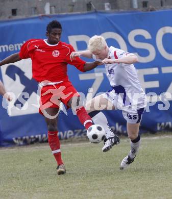 Fussball Regionalliga. SAK gegen SV Spittal. Rene Partl (SAK) Makanda Mpaka (Spittal). Klagenfurt, am 28.3.2009.
Foto: Kuess

---
pressefotos, pressefotografie, kuess, qs, qspictures, sport, bild, bilder, bilddatenbank