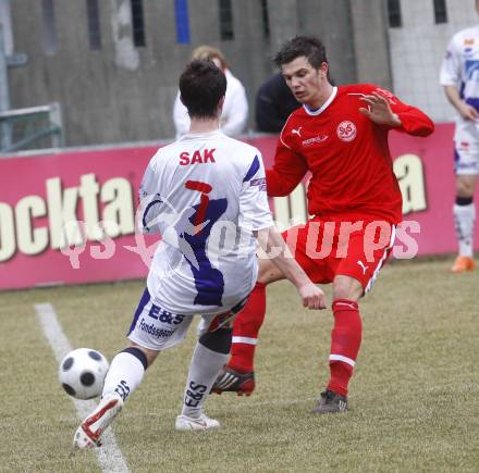 Fussball Regionalliga. SAK gegen SV Spittal. Darjan Aleksic (SAK) Salih Alic (Spittal). Klagenfurt, am 28.3.2009.
Foto: Kuess

---
pressefotos, pressefotografie, kuess, qs, qspictures, sport, bild, bilder, bilddatenbank