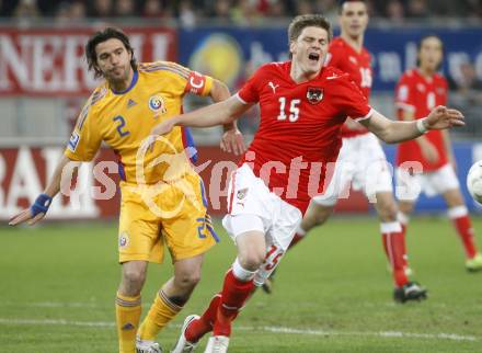 Fussball WM Qualifikationsspiel. Oessterreich gegen Rumaenien. Sebastian Proedl, (Oesterreich), Contra Cosmin Marius (Rumarnien). Hypo Group Arena, Klagenfurt, am 1.4. 2009.
Foto: Kuess

---
pressefotos, pressefotografie, kuess, qs, qspictures, sport, bild, bilder, bilddatenbank